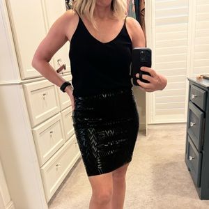 Black spandex skirt with geometric print. New without tags.